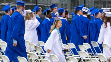 20250530_165246920 Walking toward her seat